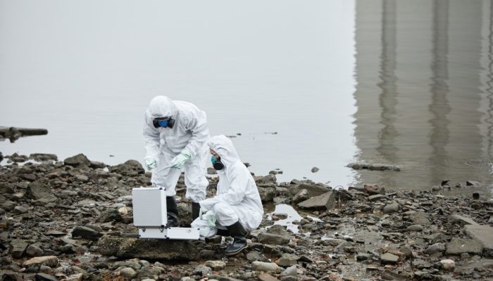 Two Workers at Industrial Disaster Site